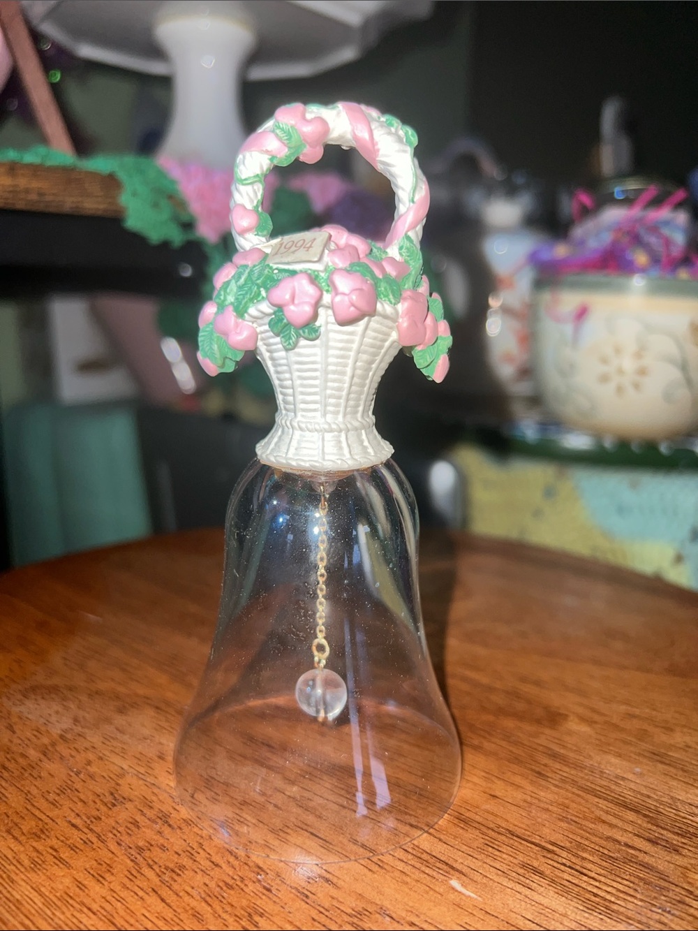 Vintage 1994 Avon "Basket of Love" crystal bell with a porcelain flower handle
